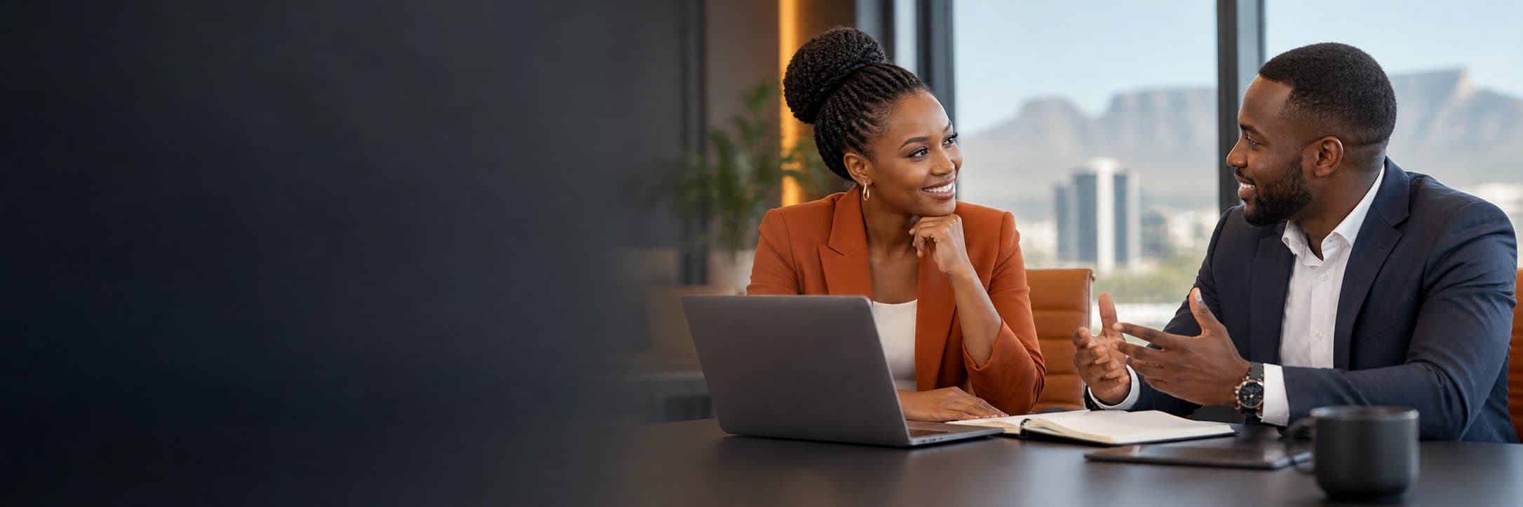 African business professionals discussing a technology solution